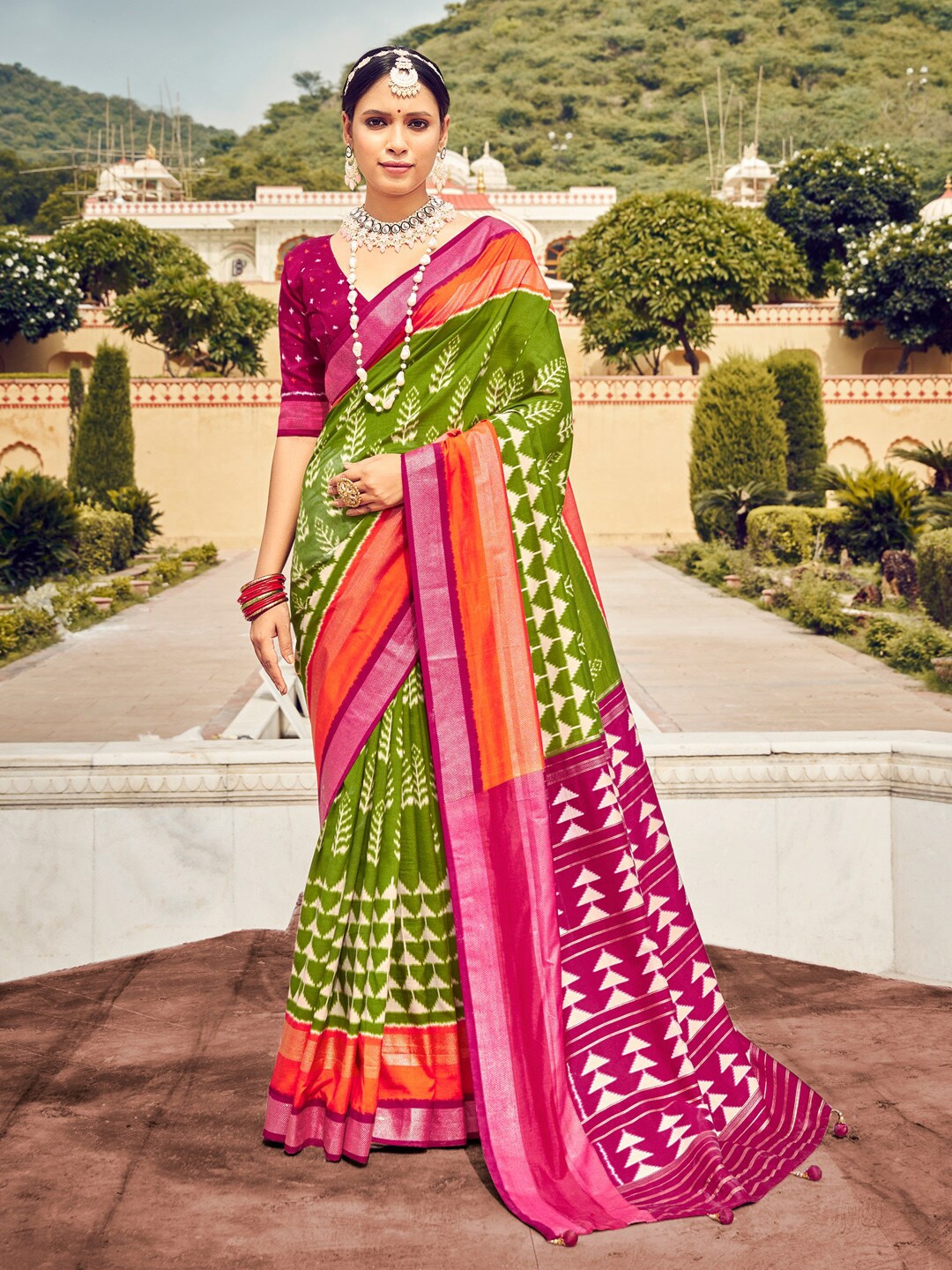 

Saree mall Ethnic Motifs Printed Zari Ikat Sarees, Green