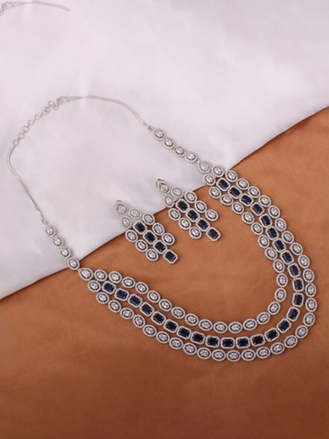 

Mirana Rhodium-Plated Studded Chrisha Sapphire Triple Layered Jewellery Set, Silver