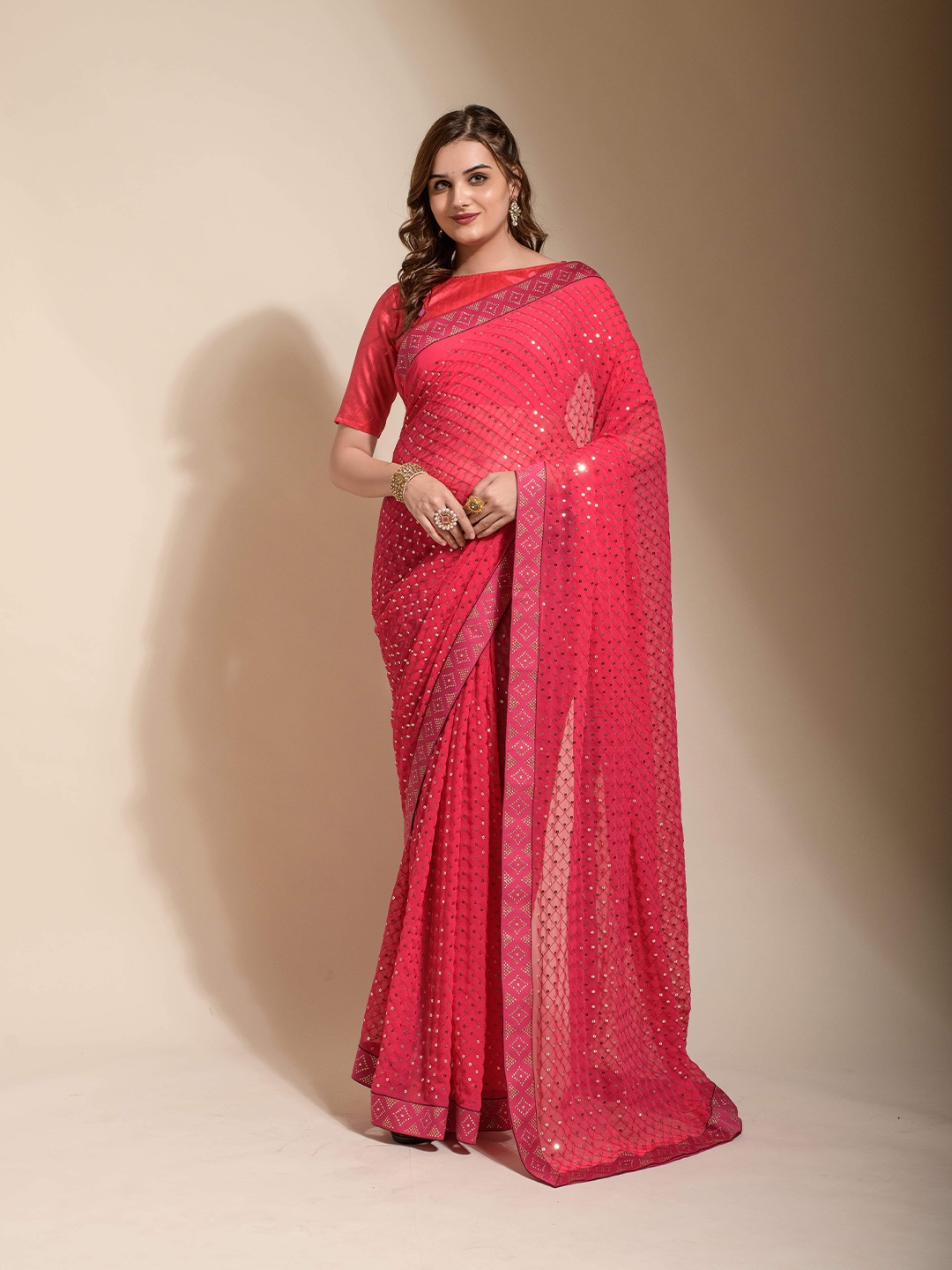 

Munir Ethnic Motifs Embellished Sequinned Pure Georgette Saree, Red