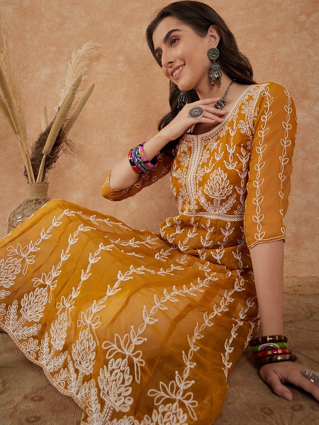 

Sangria Ethnic Motifs Embroidered Georgette A-Line Kurta, Mustard