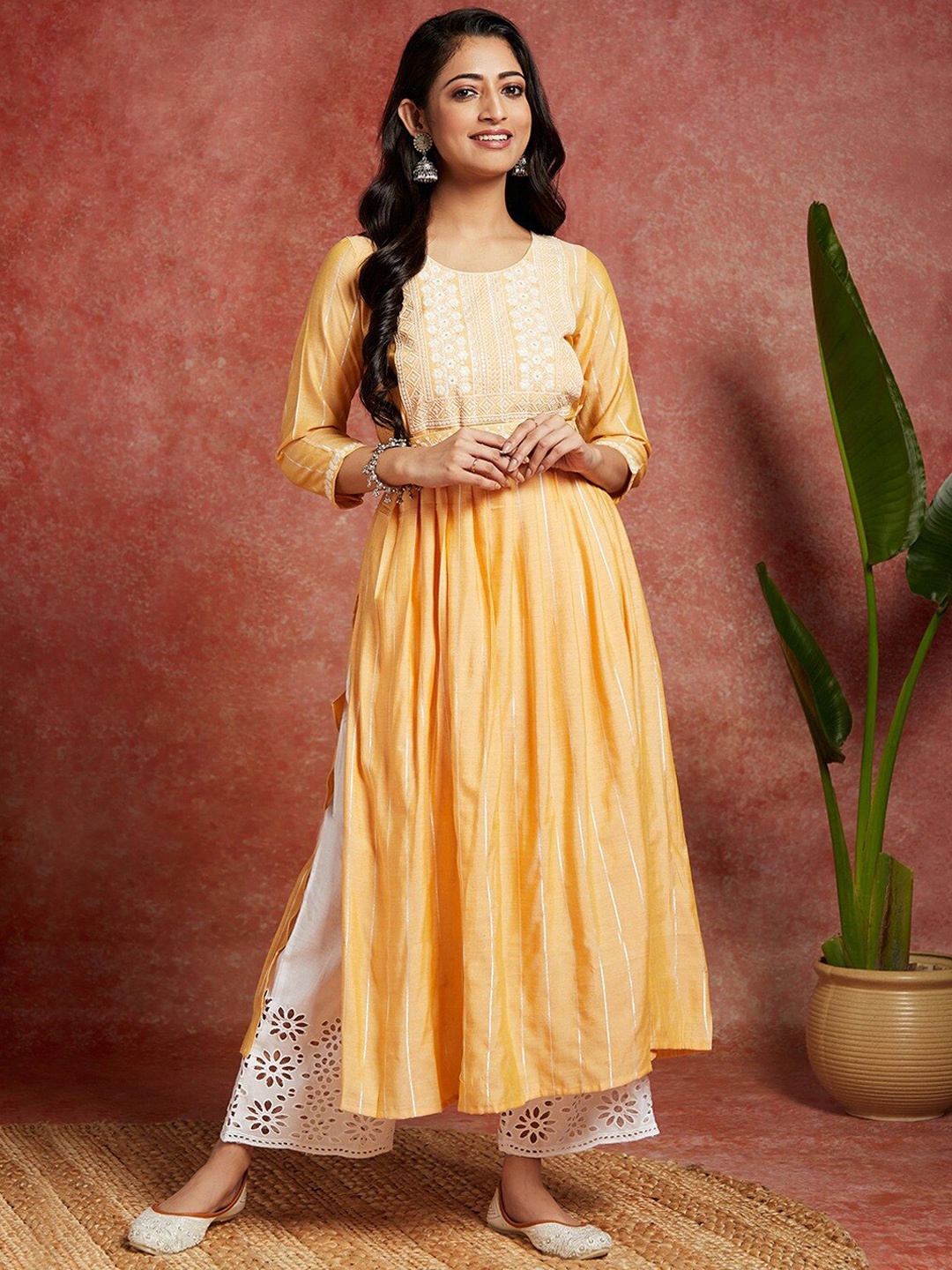 

Libas Ethnic Motifs Yoke Design Thread Work Flared Straight Kurta With Belt, Yellow