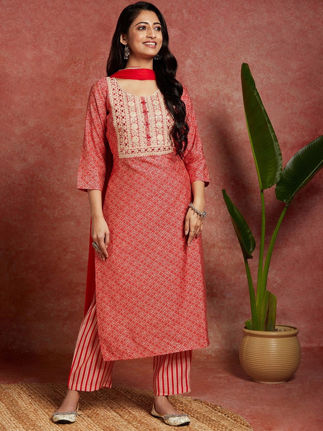 

Libas Women Coral Bandhani Printed Regular Thread Work Kurta with Palazzos & With Dupatta