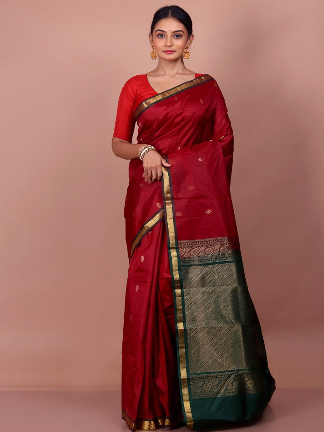 

AllSilks Maroon & Gold-Toned Ethnic Motifs Zari Silk Blend Kanjeevaram Saree