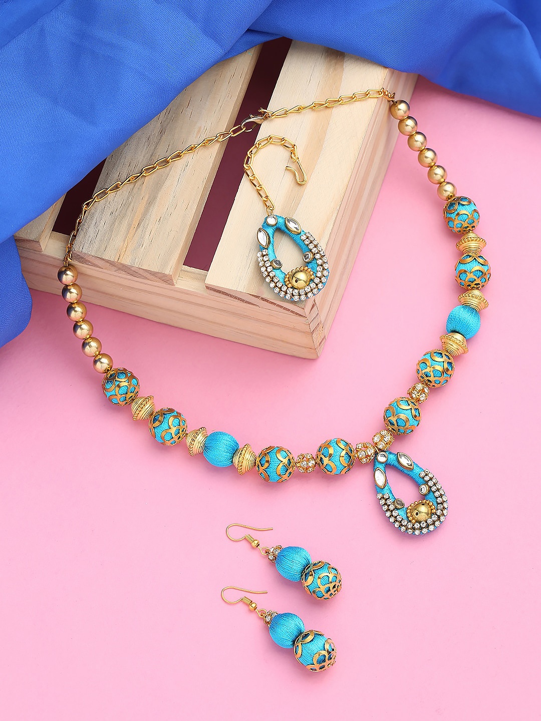 

AKSHARA Gold-Plated Stone Studded & Pearl Beaded Jewellery Set