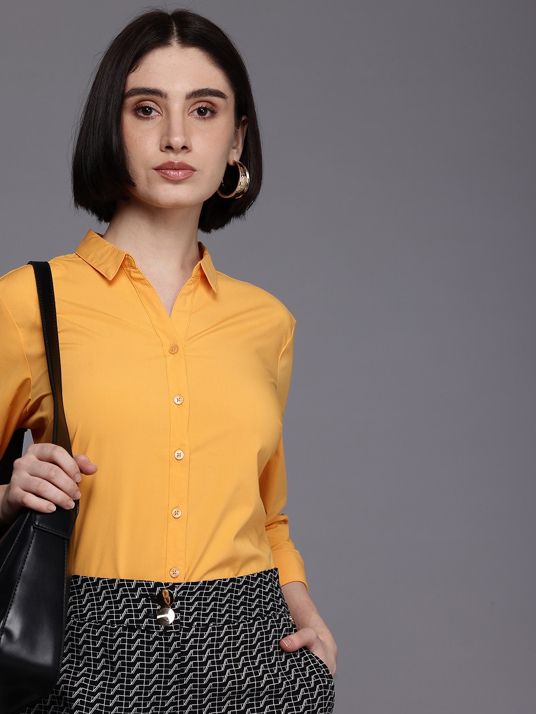 

Allen Solly Woman Solid Casual Shirt, Yellow