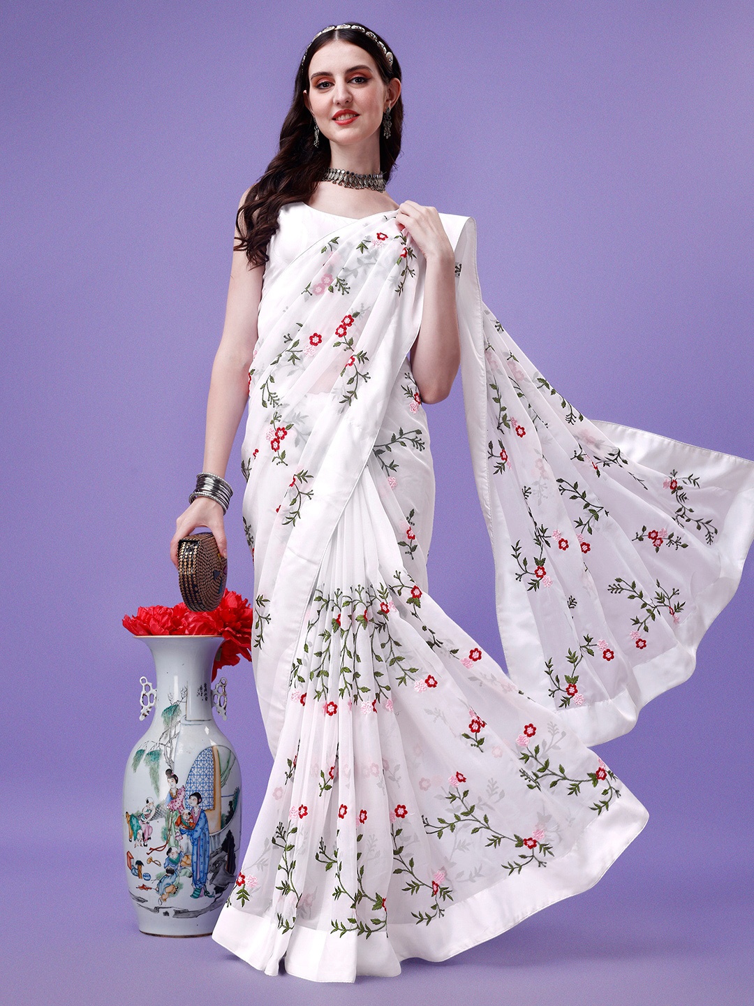 

Kedar Fab Floral Embroidered Pure Georgette Saree, White