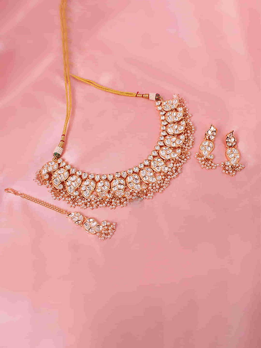 

Mirana Gold Plated & Kundan Studded Necklace & Earrings Set