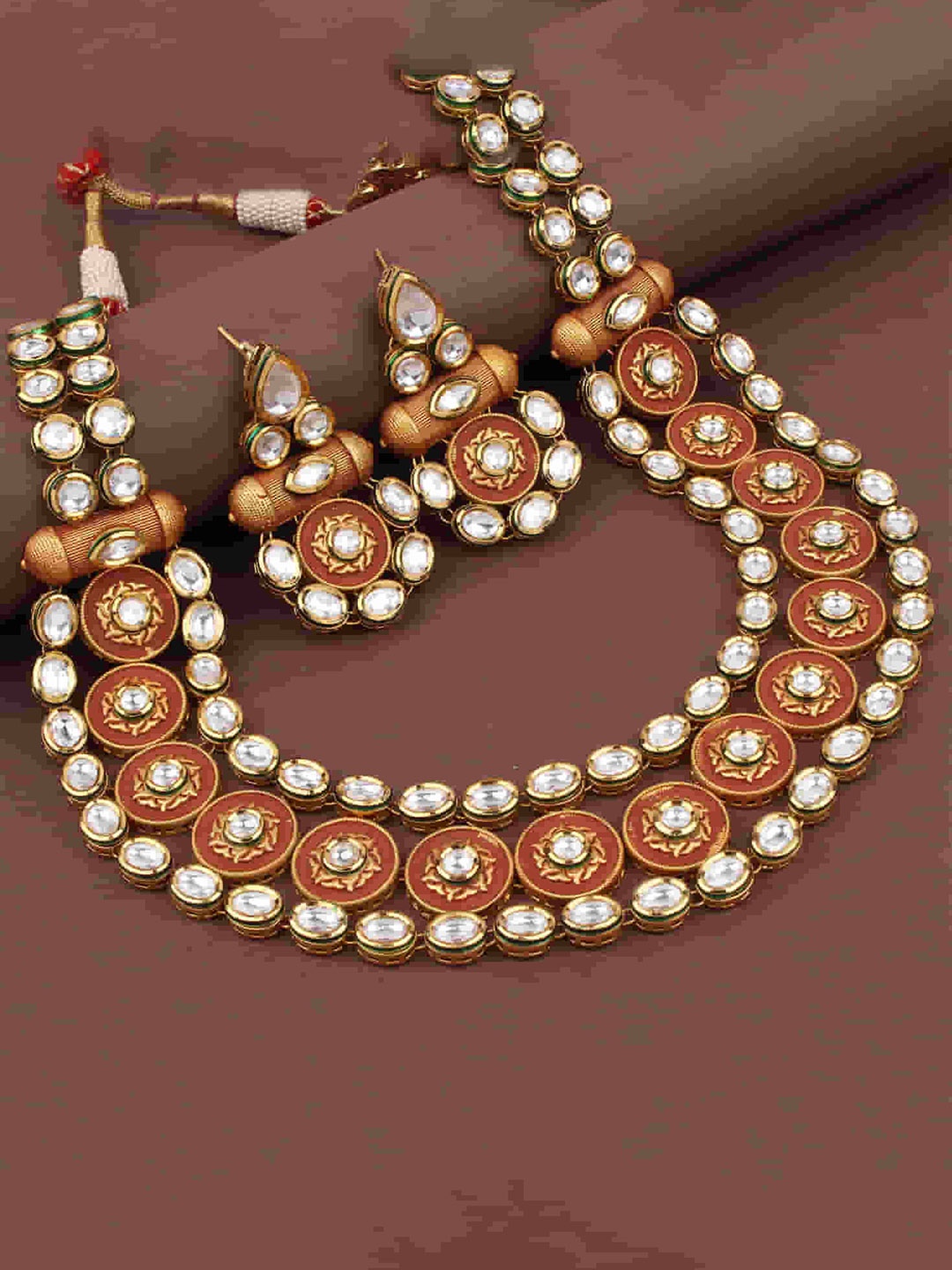 

Mirana Gold Plated Kundan Studded Jewellery Set