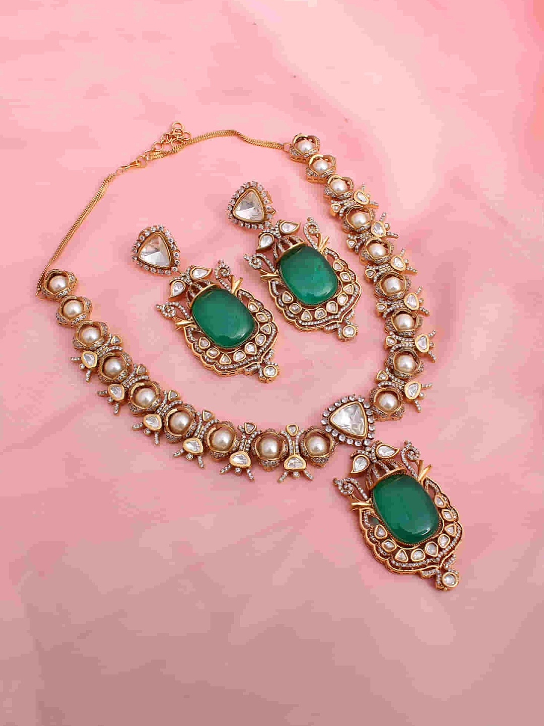 

Mirana Gold Plated & Kundan Studded Necklace & Earrings Set