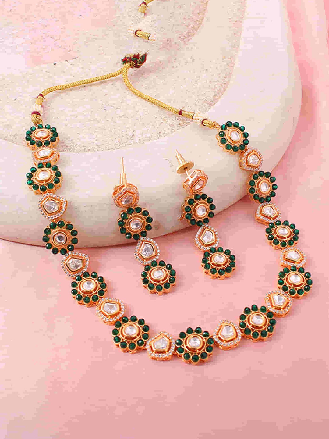 

Mirana Gold-Plated Kundan Stone Studded Jewellery Set