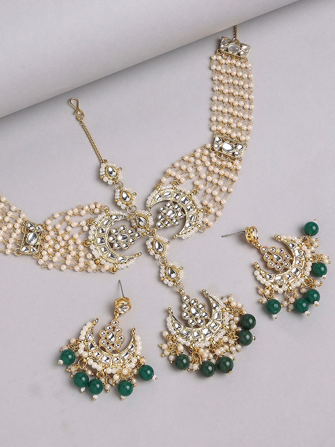 

OOMPH Gold Plated Kundan Stone Studded & Beaded Jewellery Set