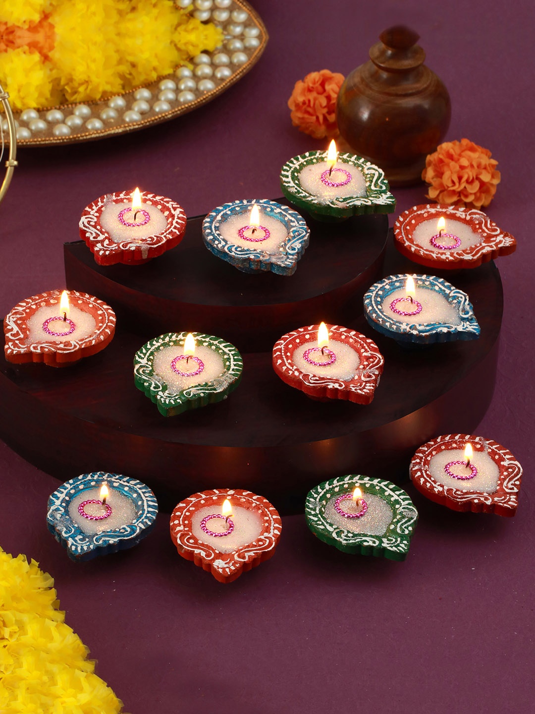 

TIED RIBBONS Red Set of 12 Terracotta Clay Wax Filled Diya Candles