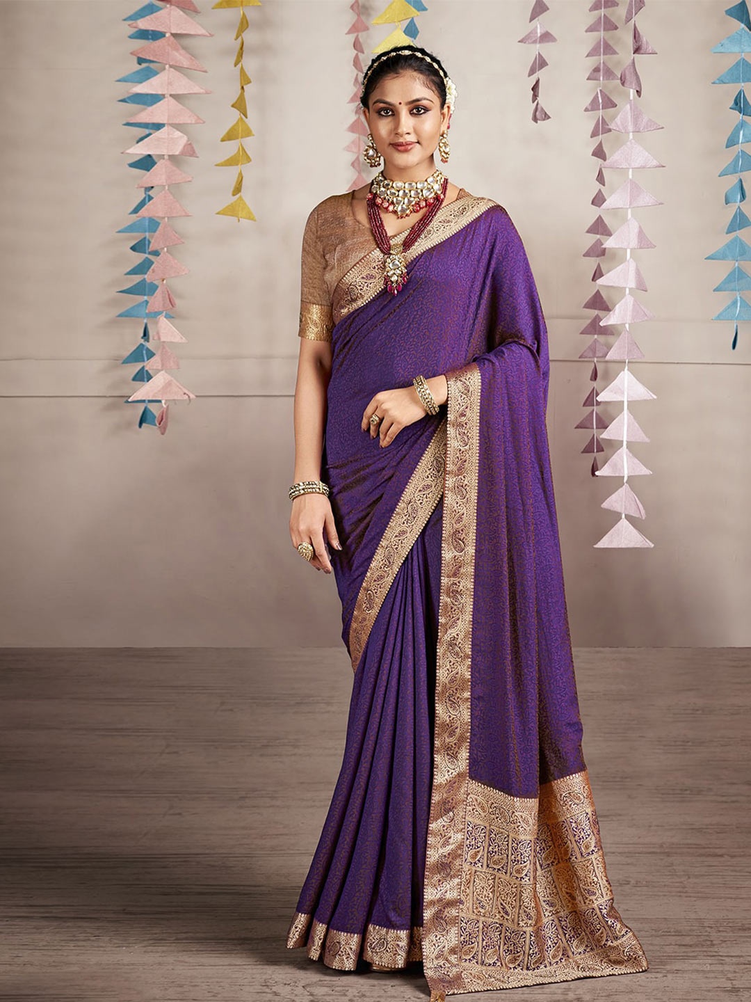 

Mitera Purple Ethnic Motifs Woven Design Zari Art Silk Saree