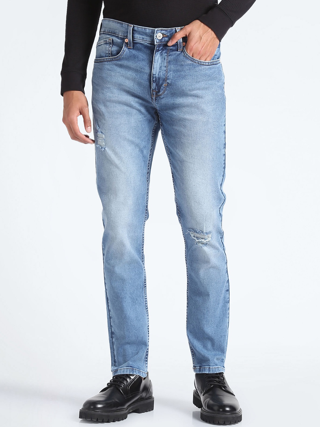

Flying Machine Men Blue Tapered Fit Mildly Distressed Heavy Fade Cotton Jeans