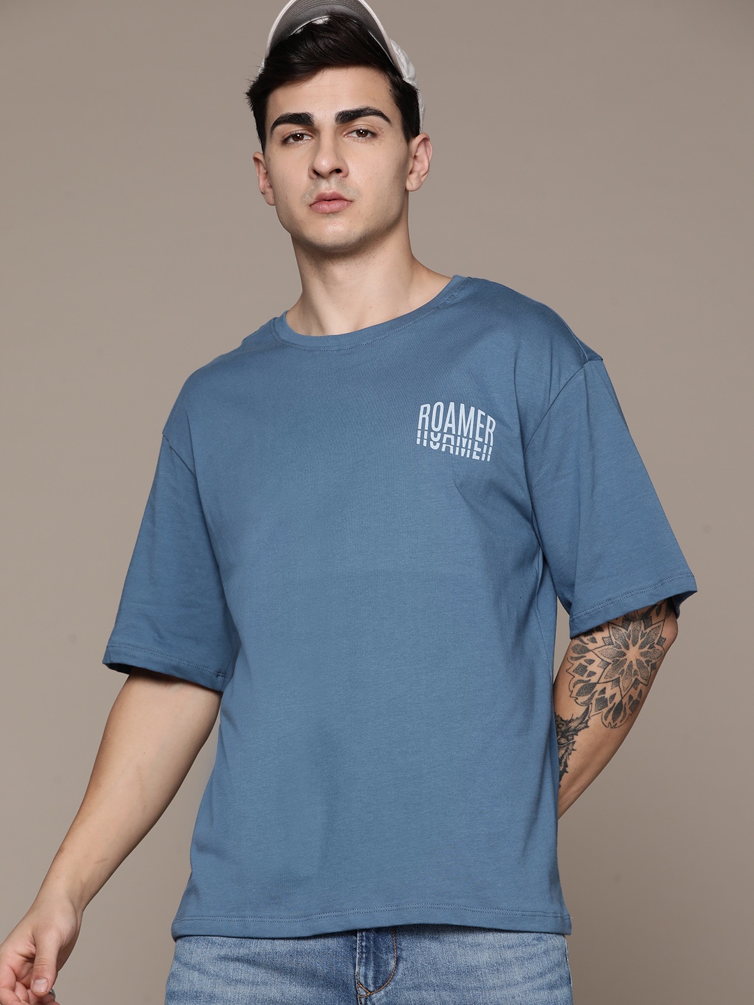 

The Roadster Lifestyle Co. Oversized Fit Drop-Shoulder Sleeves Printed Detail Pure Cotton T-shirt, Blue