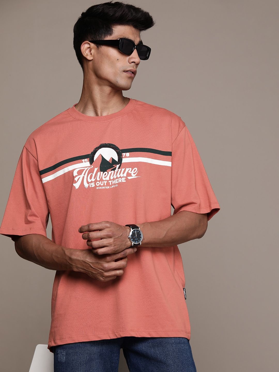 

The Roadster Lifestyle Co. Typography Printed Drop-Shoulder Sleeves Pure Cotton T-shirt, Rust