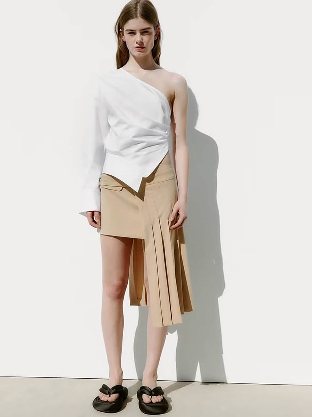

LULU & SKY Cut-Out Slits Mini Skirts, Beige
