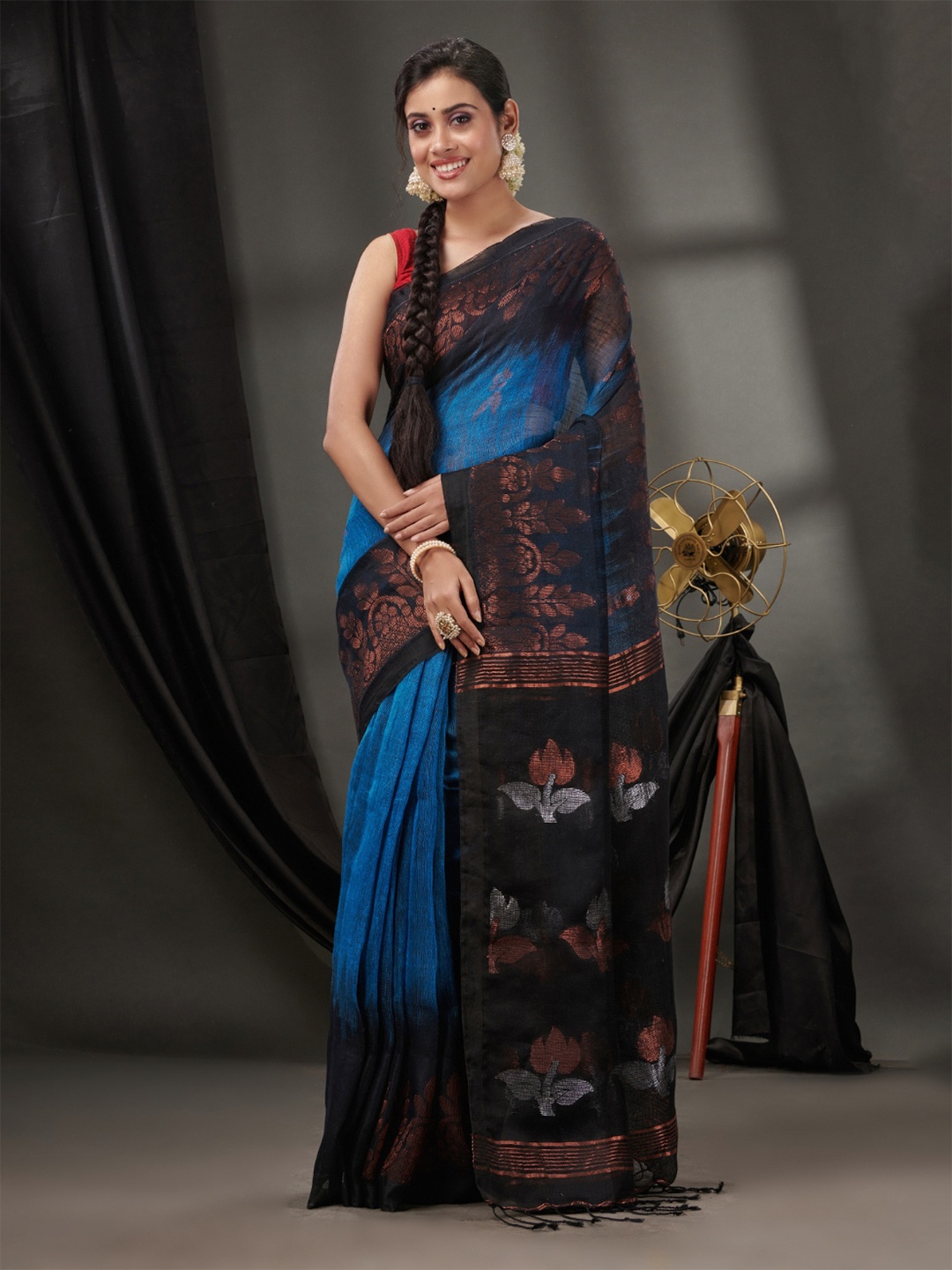 

Charukriti Woven Design Pure Linen Ikat Saree, Blue