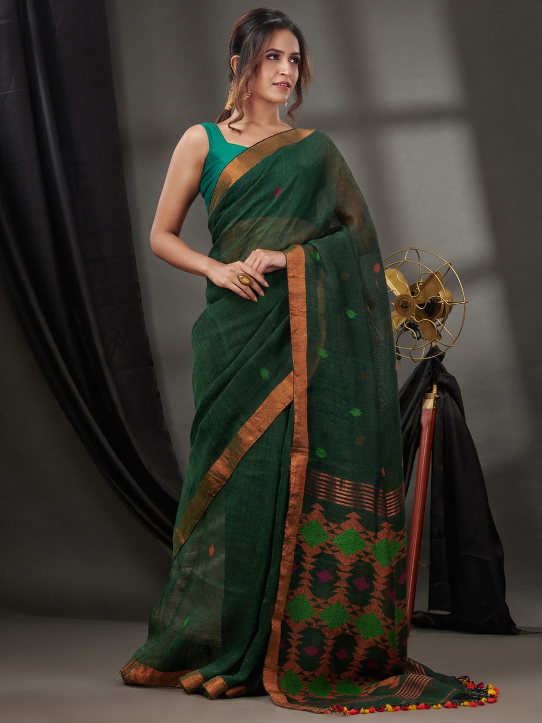 

Charukriti Ethnic Motifs Woven Design Zari Detailed Pure Linen Saree, Green