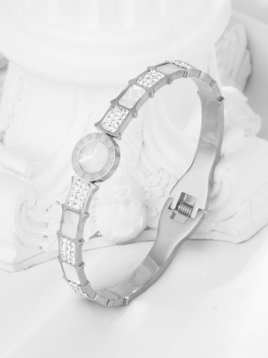 

Jewels Galaxy Stainless Steel Silver-Plated American Diamond Studded Cuff Bracelet