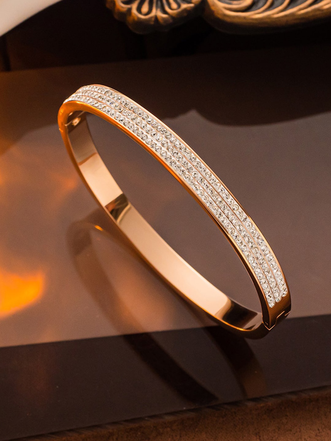 

Jewels Galaxy Women Rose Gold-Plated American Diamond-Studded Bangle-Style Bracelet