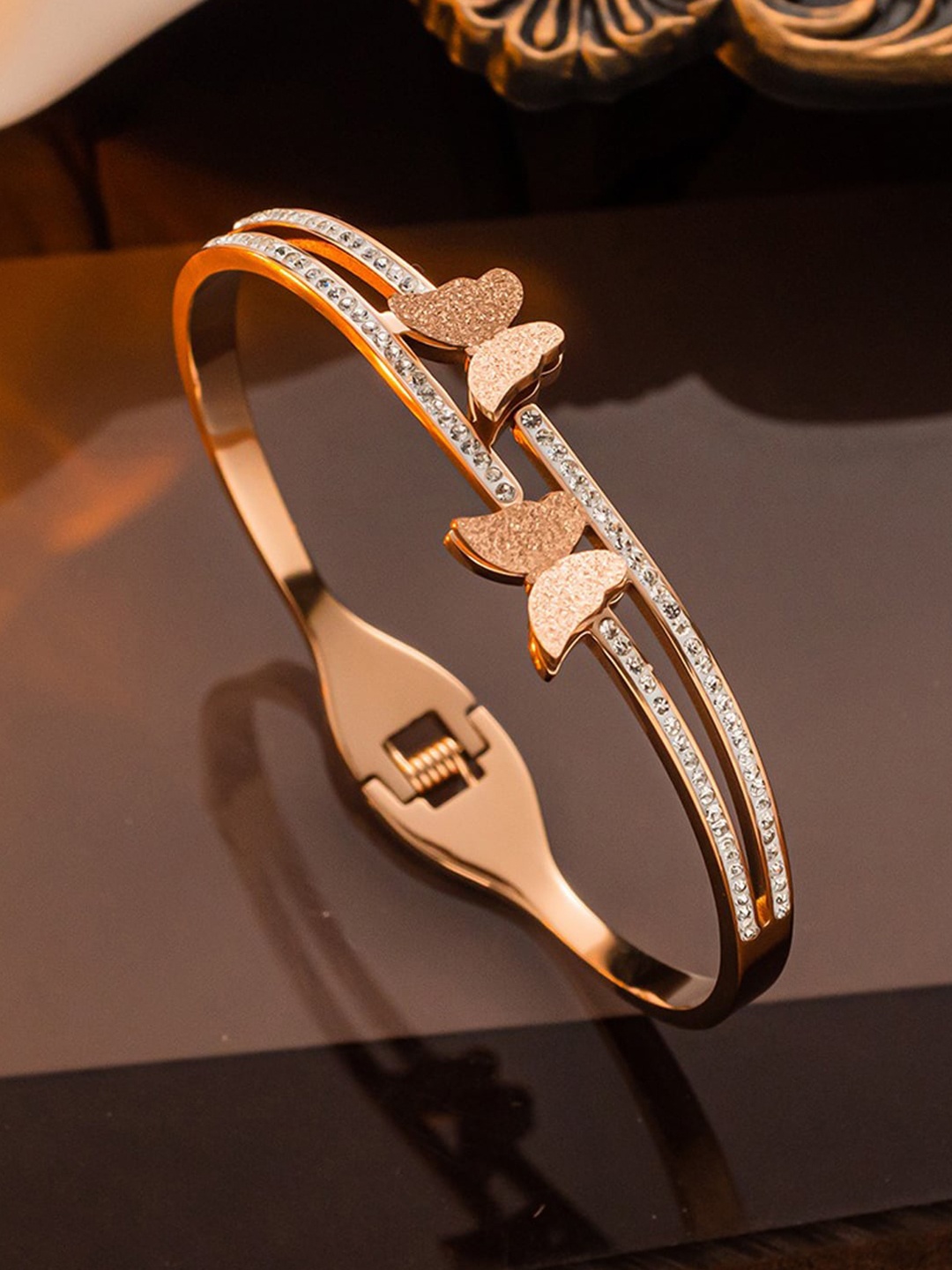 

Jewels Galaxy Women Rose Gold Plated American Diamond Stainless Steel Bangle Bracelet