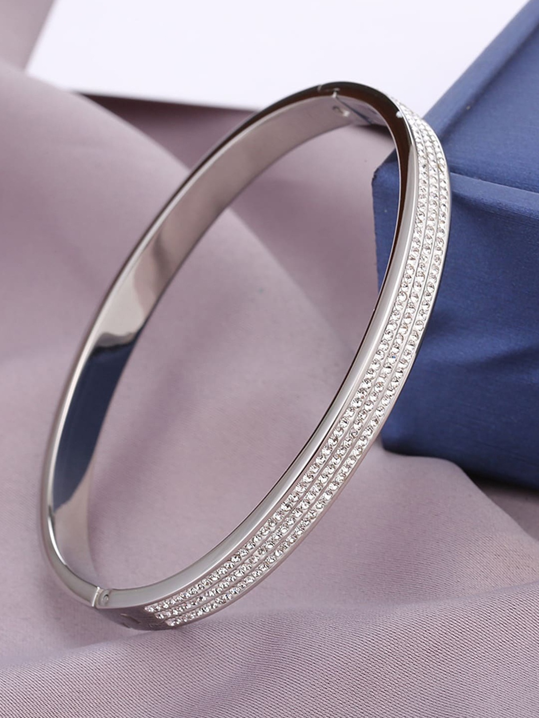 

Jewels Galaxy American Diamond Silver Plated Bangle Style Bracelet