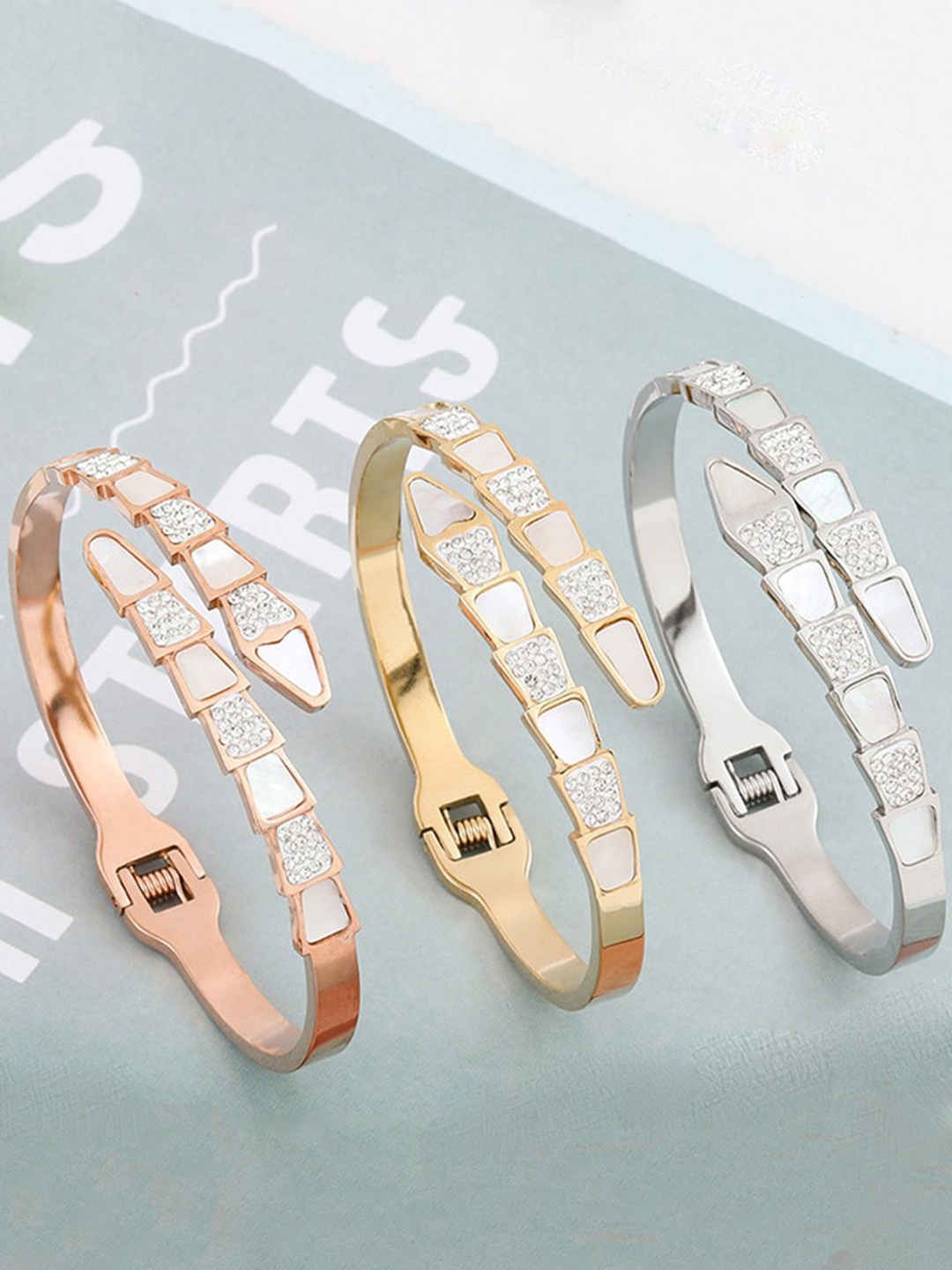 

Jewels Galaxy Set Of 3 Stainless Steel Mother of Pearl AD Studded Bracelets, Gold