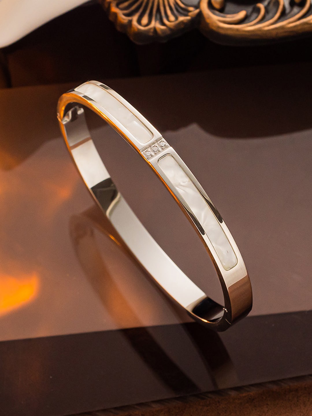 

Jewels Galaxy Stainless Steel Silver-Plated Bangle-Style Bracelet