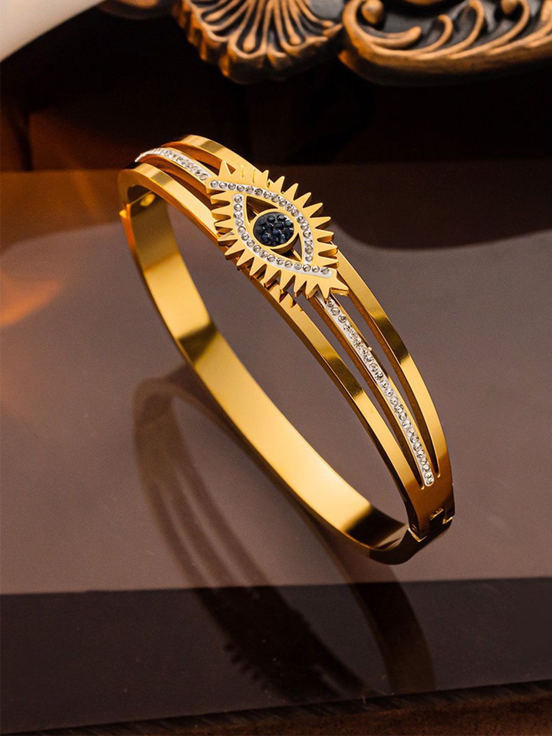 

Designs & You Gold-Plated American Diamond Studded Bangle-Style Bracelet
