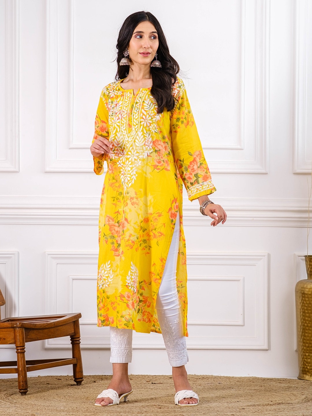

Chowkhat Floral Printed Thread Work Regular Cotton Kurta, Yellow