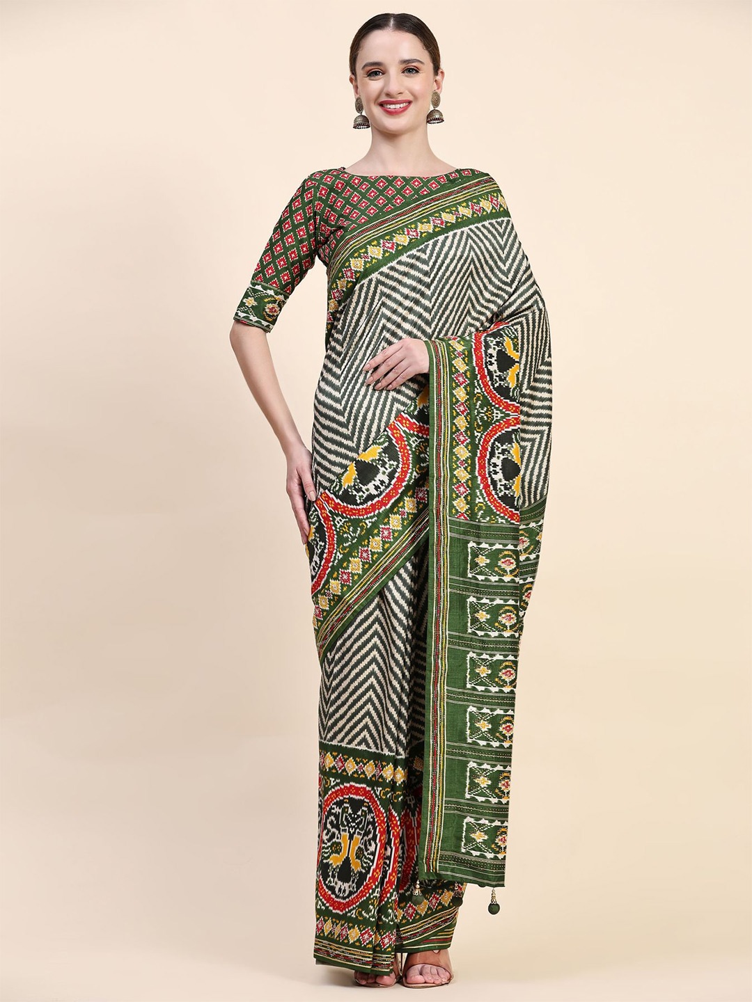 

Phenav Leheriya Printed Pure Silk Patola Saree, Green