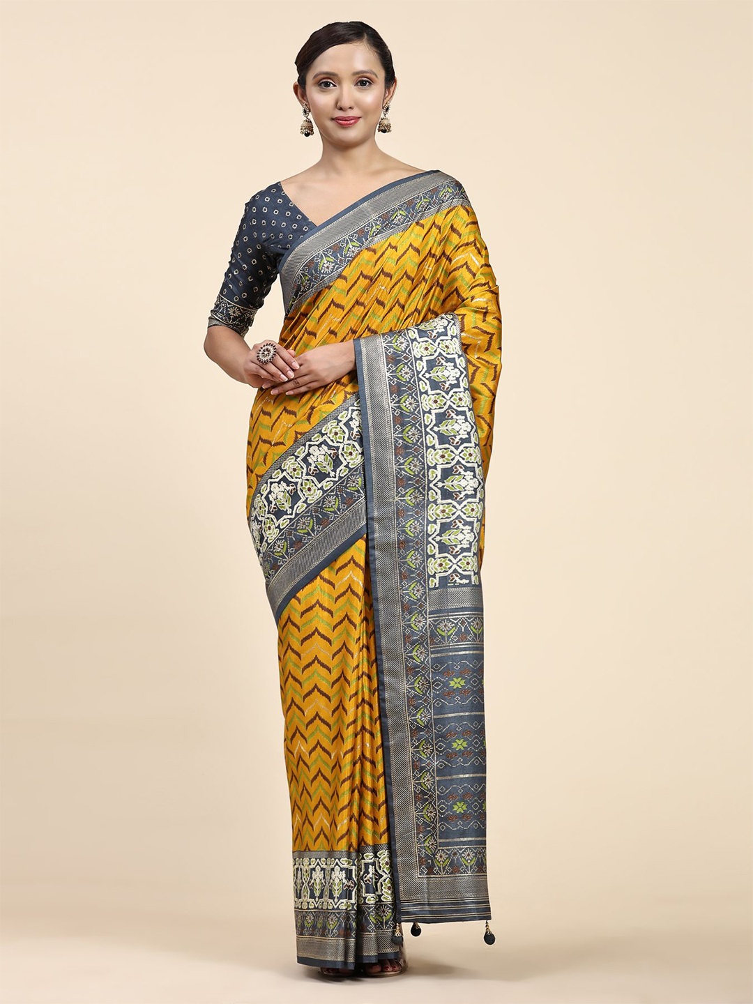 

Phenav Ethnic Motifs Printed Pure Silk Patola Saree, Yellow