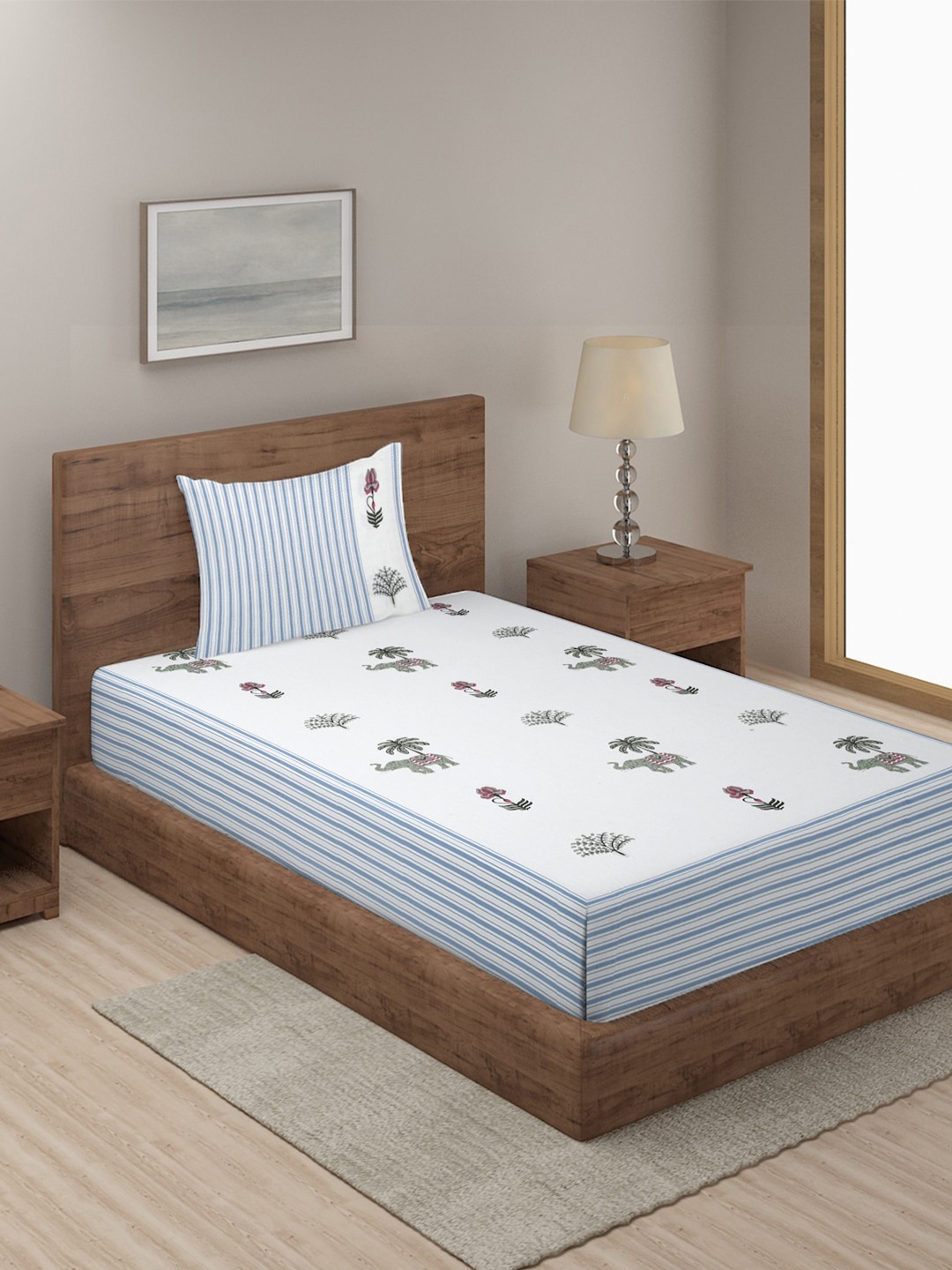 

Sangria White & Blue Printed 180 TC Cotton Single Bed Bedsheet With 1 Pillow Cover