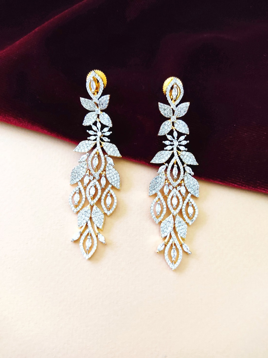 

Pihtara Jewels Gold-Plated American Diamond Studded Leaf Shaped Drop Earrings