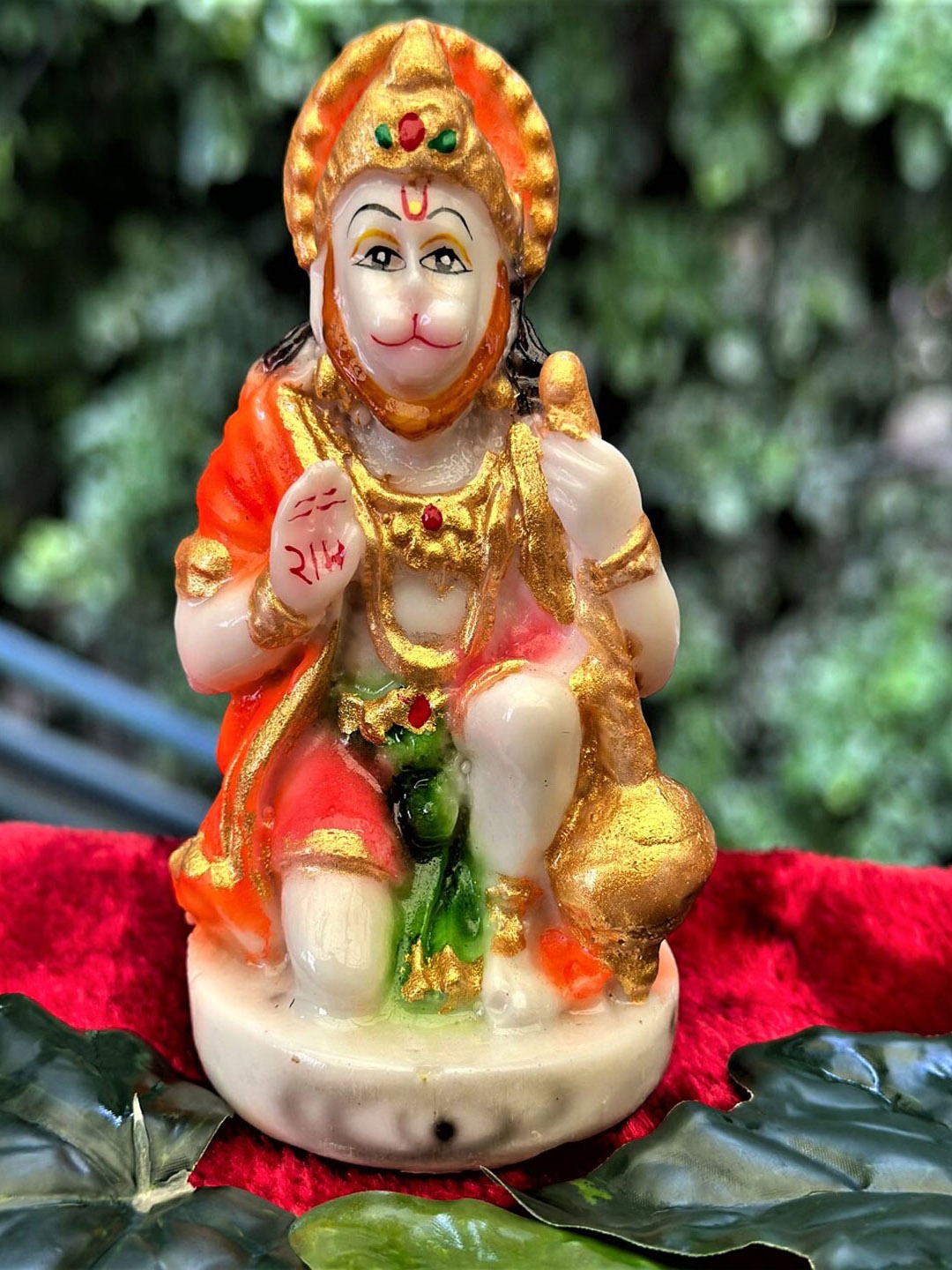 

Gallery99 Orange & Gold-Toned Textured Lord Hanuman Showpiece