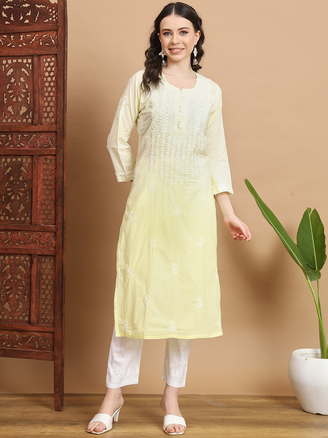

Ethnava Ethnic Motifs Embroidered Round Neck Thread Work Cotton Straight Kurta, Yellow