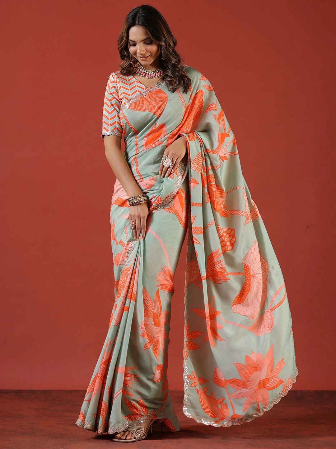 

Sangria Sea Green Floral Printed Zari Saree