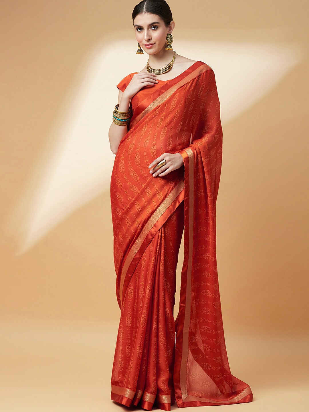 

Anouk Ethnic Motifs Printed Zari Pure Chiffon Block Print Saree, Mustard