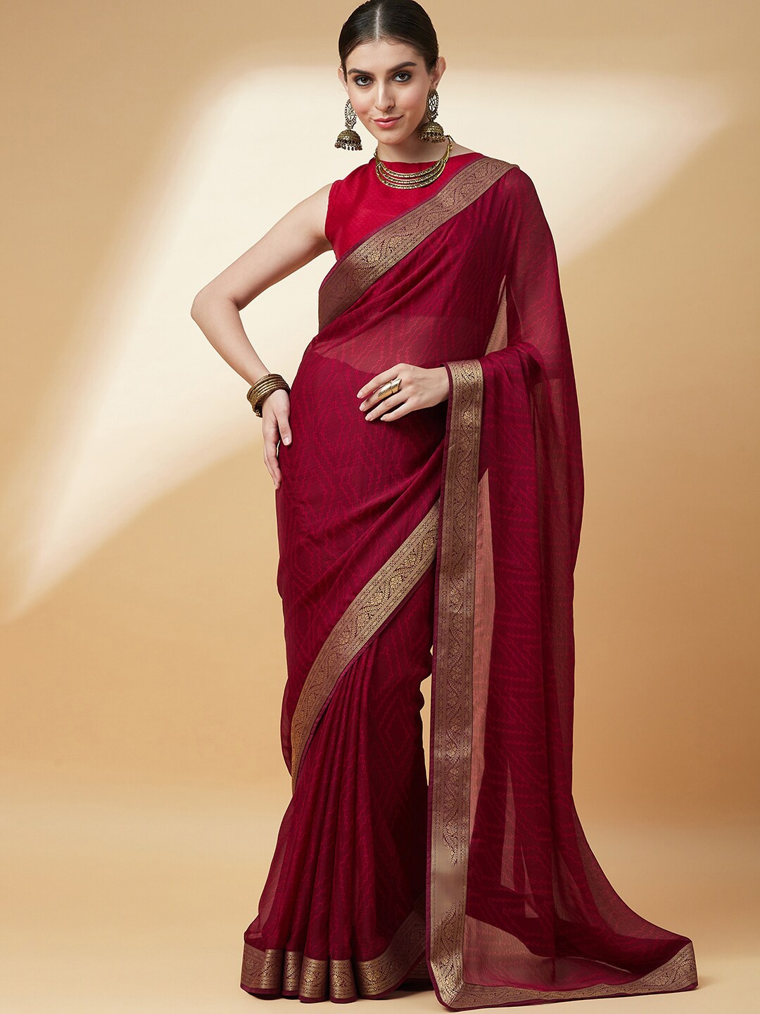 

Anouk Burgundy & Gold-Toned Geometric Printed Bandhani Saree