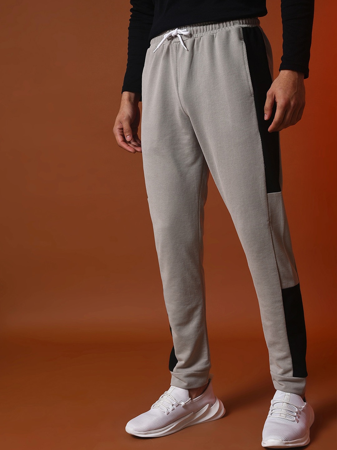 

Campus Sutra Men Colourblocked Cotton Track Pants, Grey