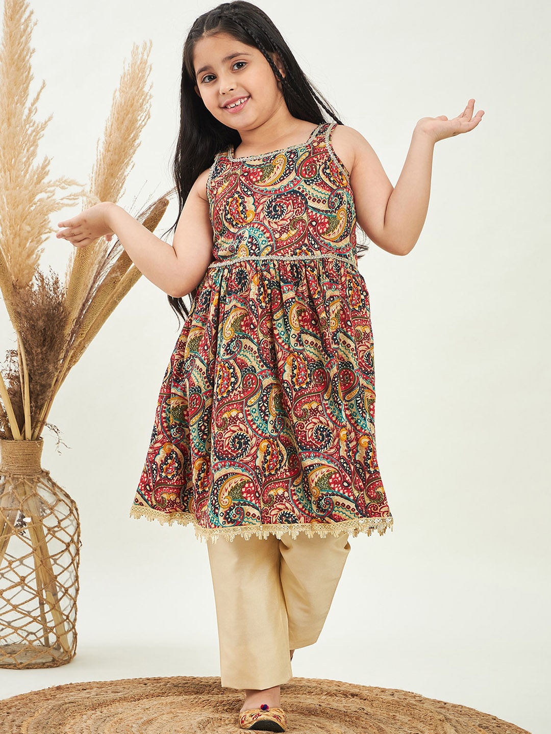 

Stylo Bug Girls Ethnic Motifs Printed Kurta with Trousers, Yellow