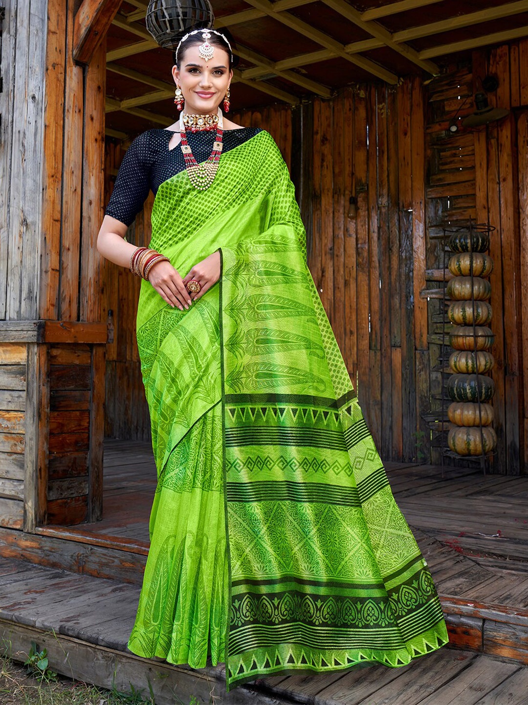 

Anouk Rustic Green Ethnic Motifs Printed Saree