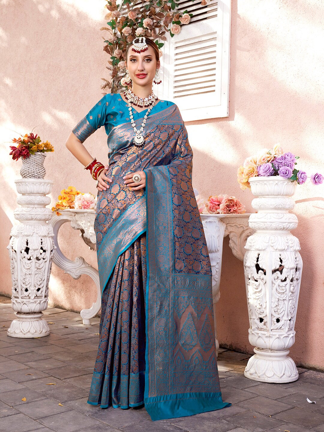

Anouk Turquoise Blue Floral Woven Design Zari Detailed Kanjeevaram Saree