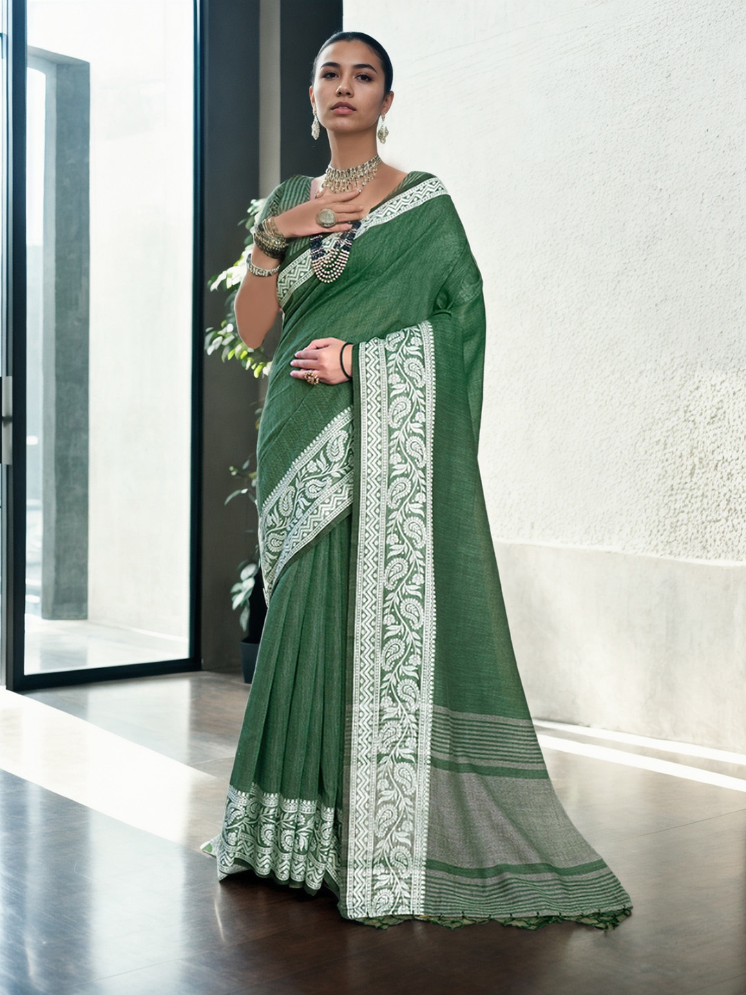 

Anouk Green Paisley Woven Design Saree