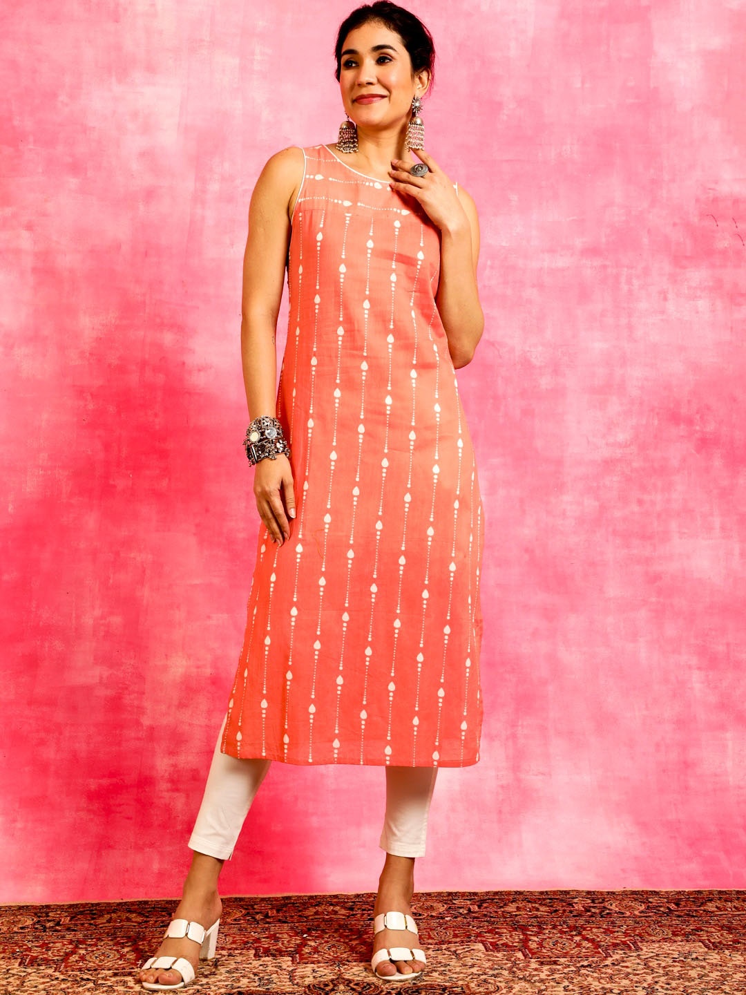 

Anouk Peach Geometric Printed Round Neck Sleeveless Straight Cotton Kurta