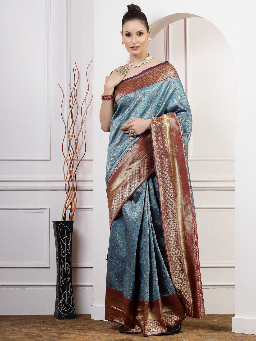 

Satrani Turquoise Blue & Red Woven Design Zari Art Silk Saree
