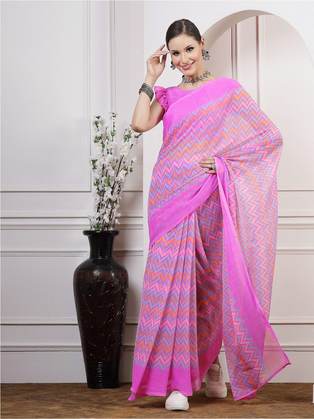 

Satrani Pink & Blue Poly Chiffon Saree