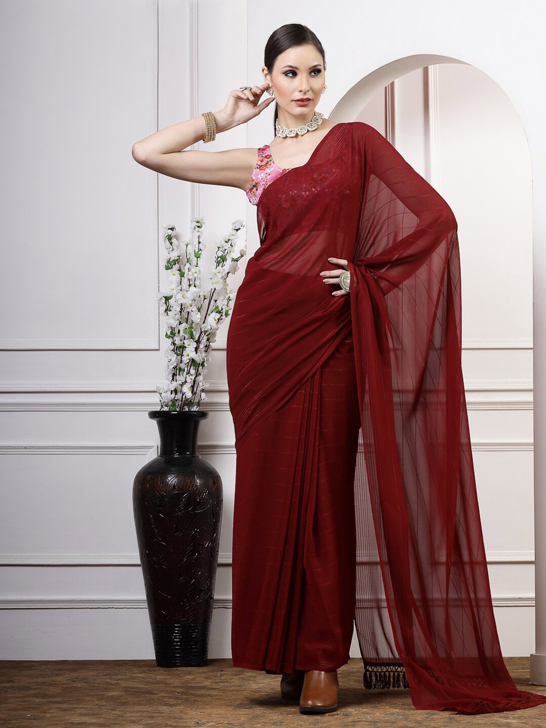 

Satrani Maroon Striped Poly Georgette Saree