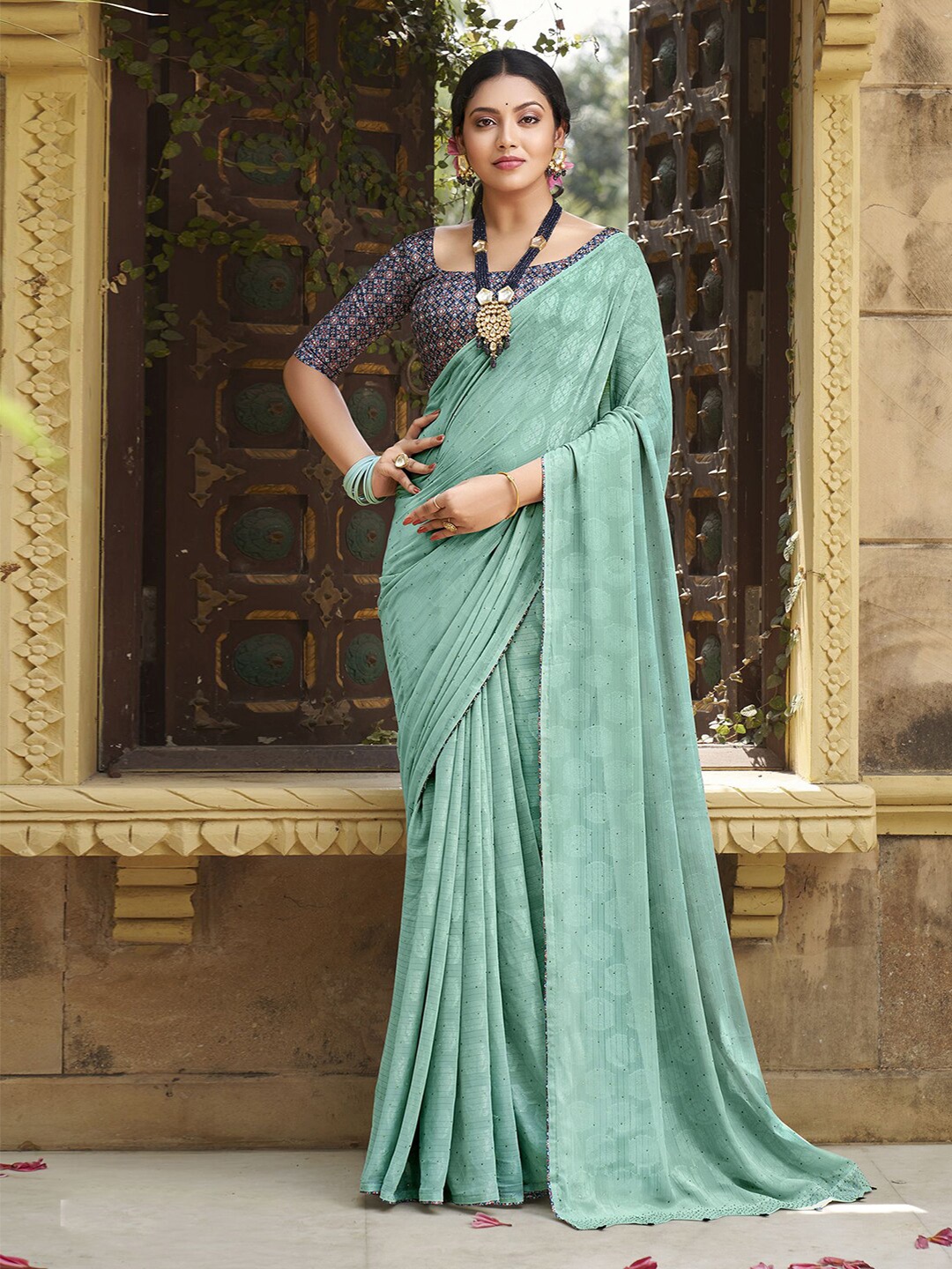 

Satrani Green & Blue Ethnic Motifs Beads and Stones Poly Georgette Saree